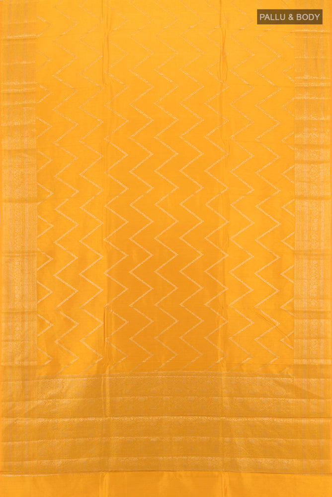 Flat view of Yellow Tussar Silk Saree with Zari Brocade on the body and Silk Border. 