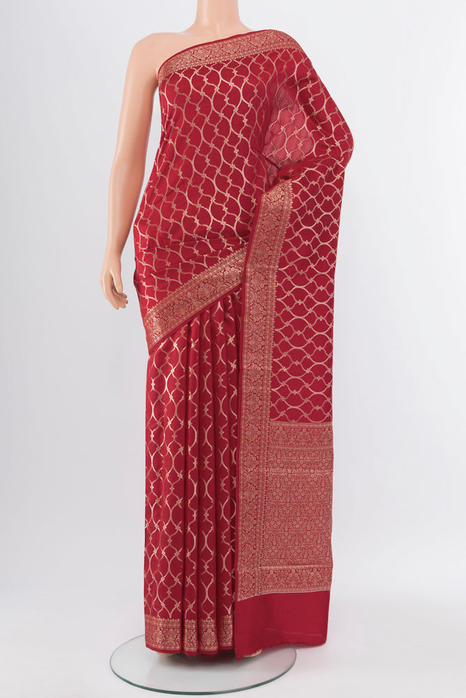 Red Banarasi Katan Silk Saree with Zari Butta on the body and Silk Border.  displayed on a mannequin
