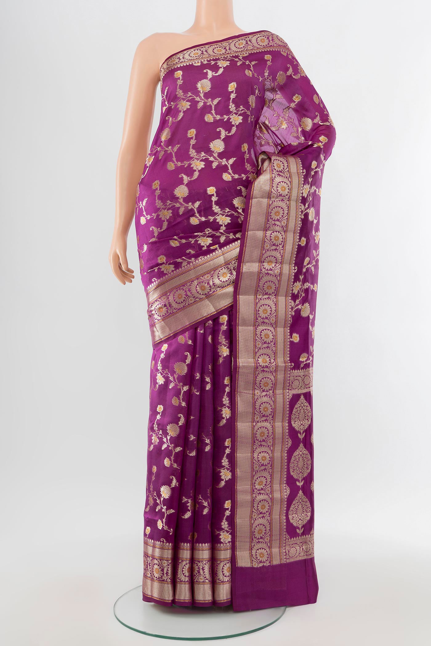 Purple Banarasi Raw Silk Saree with Zari Butta on the body and Silk Border.  displayed on a mannequin