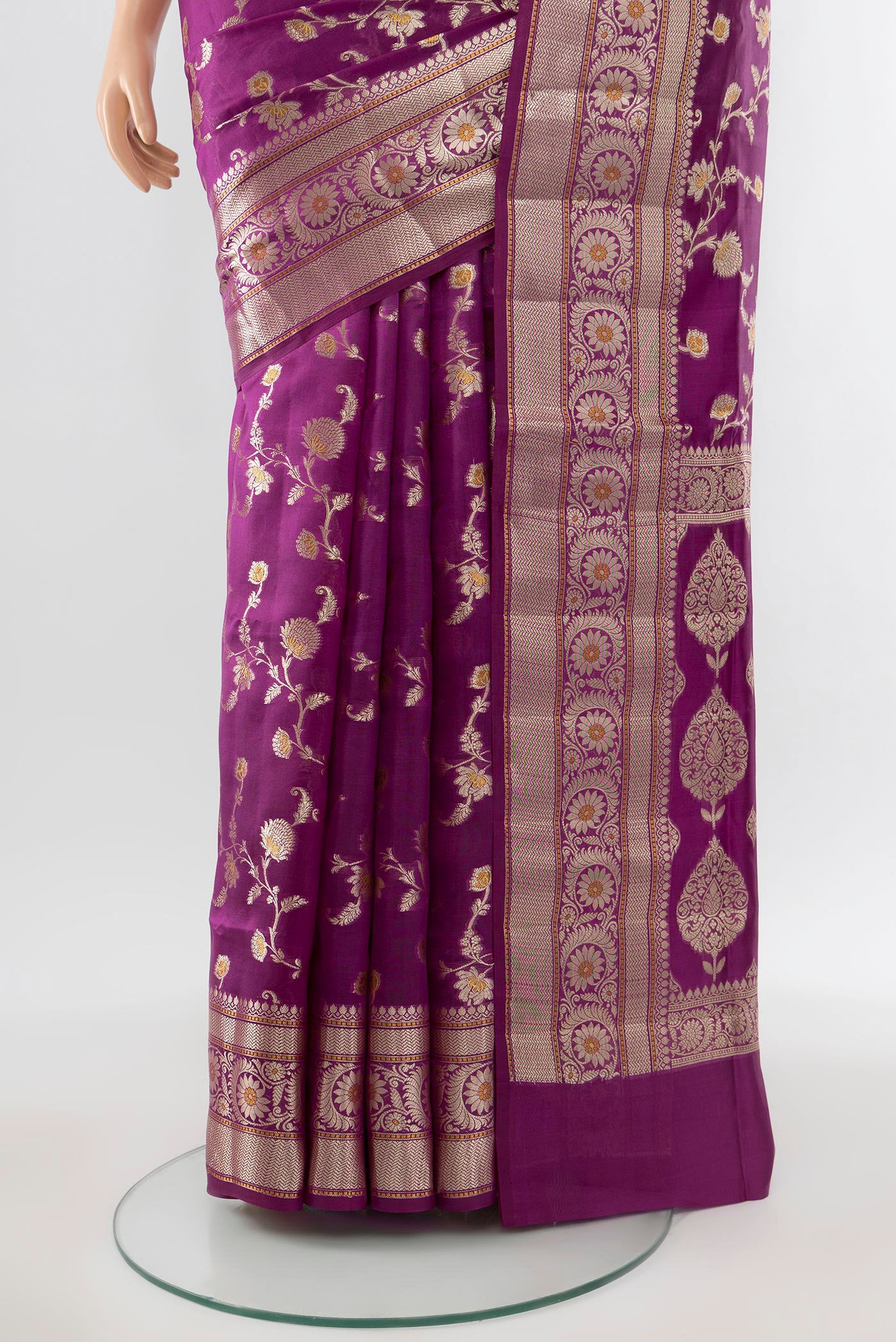 Pleats and pallu of Purple Banarasi Raw Silk Saree with Zari Butta on the body and Silk Border. 