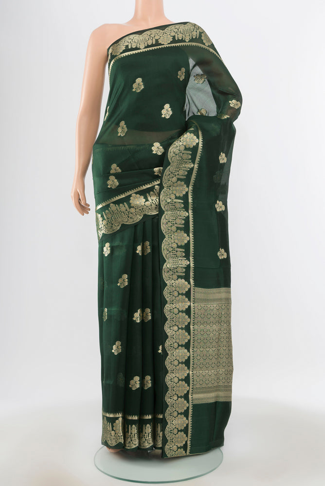 Pure Silk Pure Zari Mint Green Banarasi Saree with Zari Butta on the body and Silk Border.  displayed on a mannequin