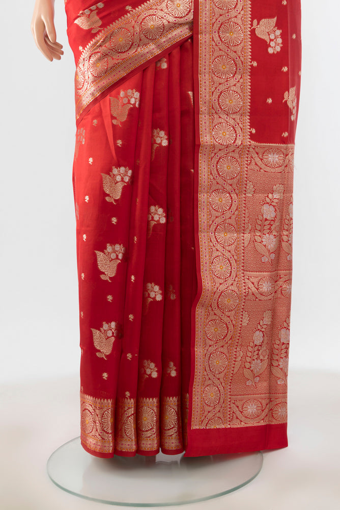 Pleats and pallu of Red Banarasi Raw Silk Saree with Zari Brocade on the body and Silk Border. 