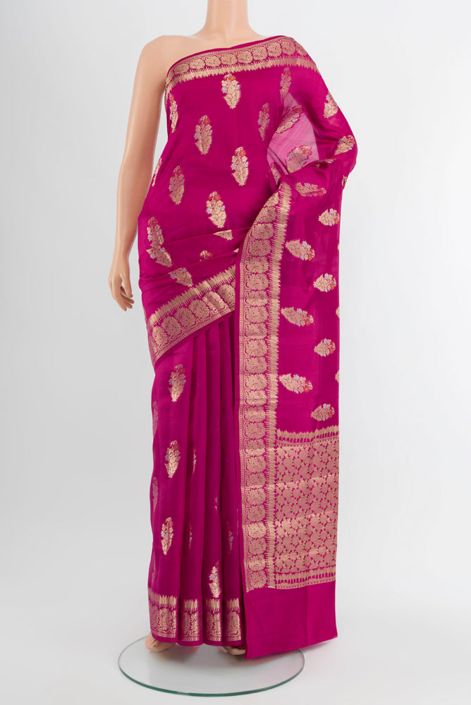 Purple Banarasi Raw Silk Saree with Zari Butta on the body and Silk Border.  displayed on a mannequin