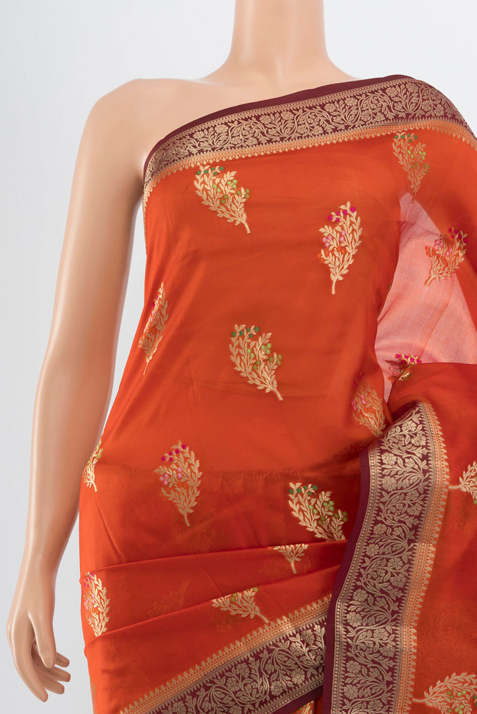 Border image of Pure Silk Pure Zari Rust Banarasi Raw Saree with Zari Butta on the body and Silk Border. 
