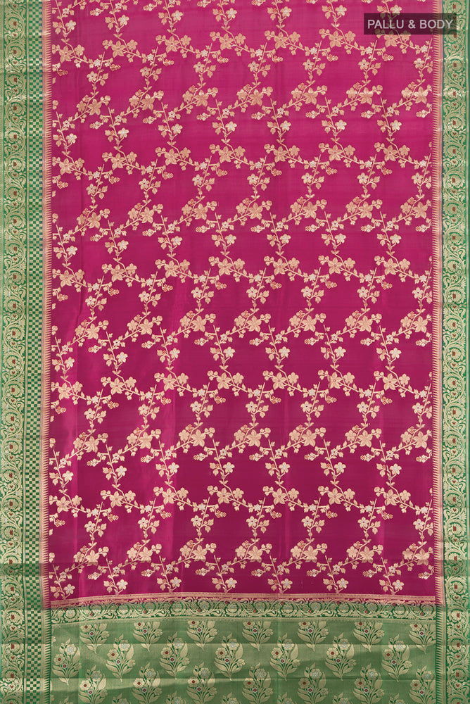 Flat view of Purple Banarasi Raw Silk Saree with Zari Butta on the body and Silk Border. 