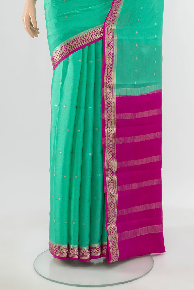 Pleats and pallu of Teal Mysore Crepe Saree with Plain Body and Silk Border. 