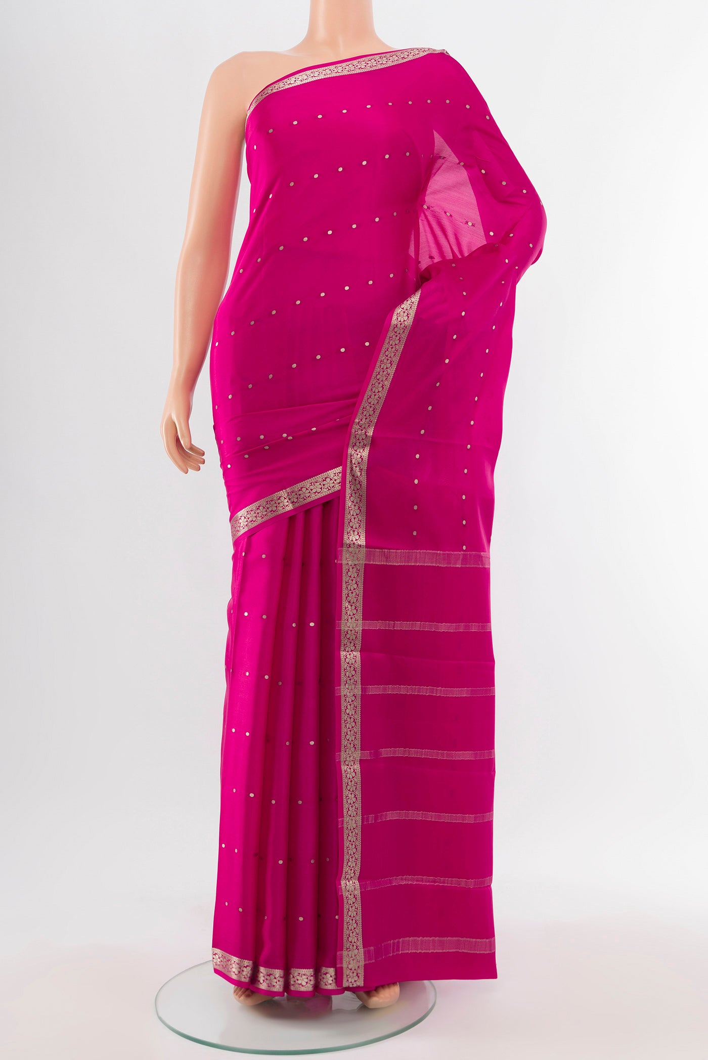 Magenta Mysore Crepe Saree with Plain Body and Silk Border.  displayed on a mannequin