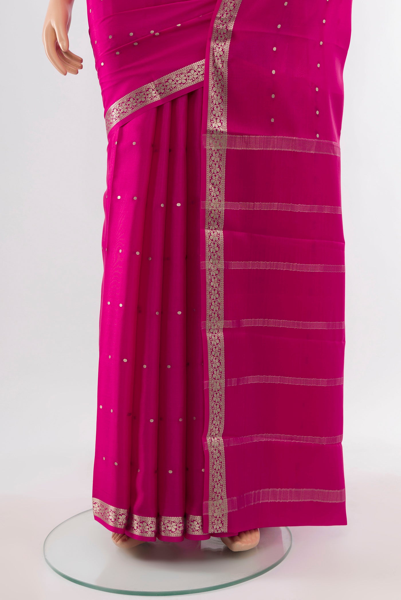 Pleats and pallu of Magenta Mysore Crepe Saree with Plain Body and Silk Border. 