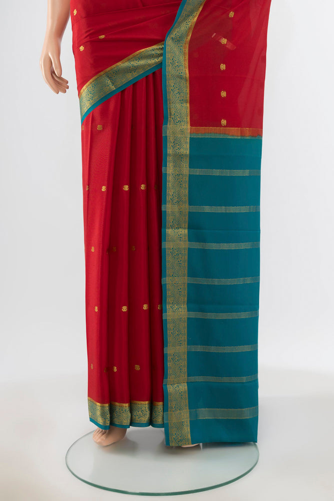 Pleats and pallu of Pure Silk Pure Zari Maroon Mysore Crepe Saree with Zari Butta on the body and Silk Border. 