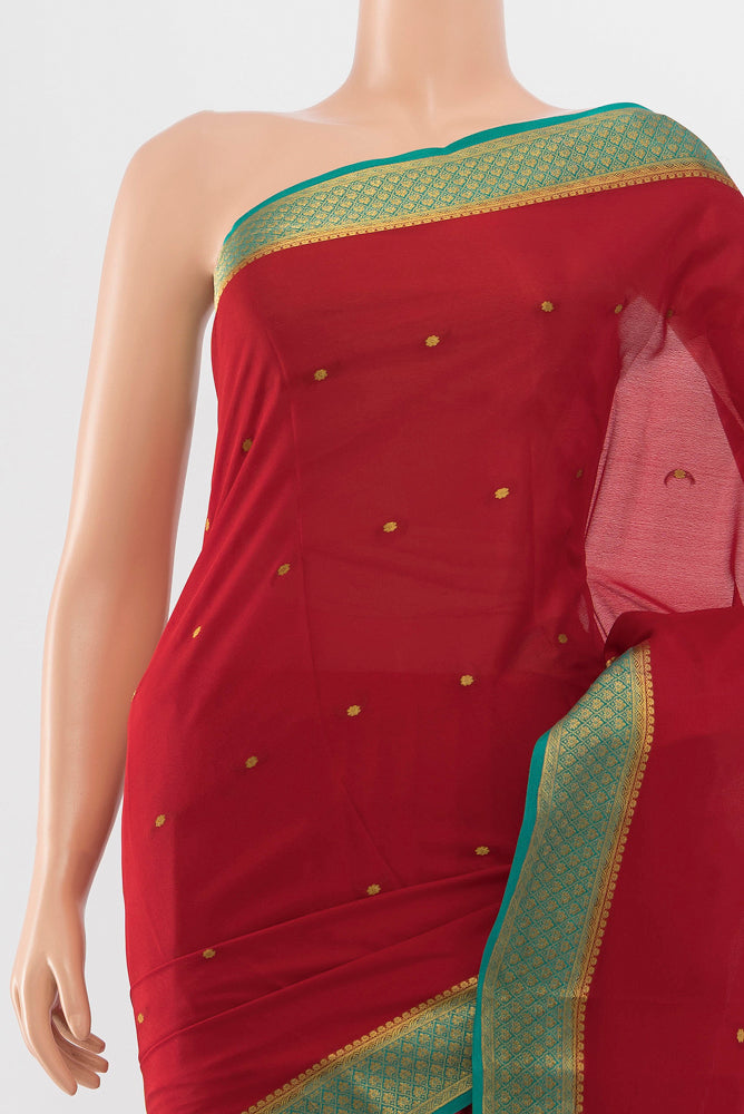 Border image of Red Mysore Crepe Saree with Zari Butta on the body and Silk Border. 