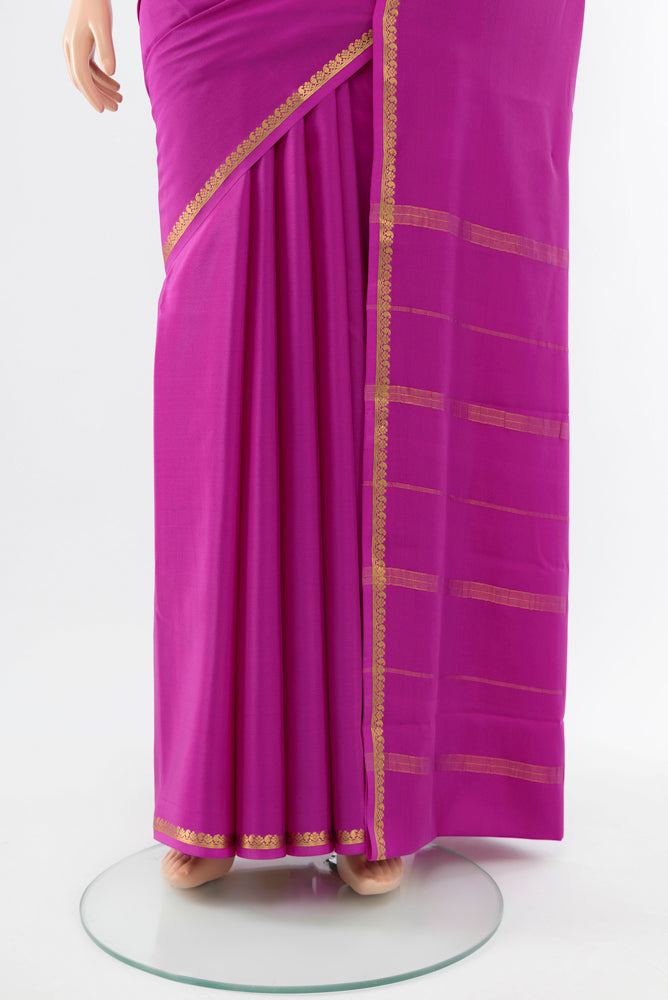 Pleats and pallu of Purple Mysore Crepe Saree with Plain Body and Silk Border. 