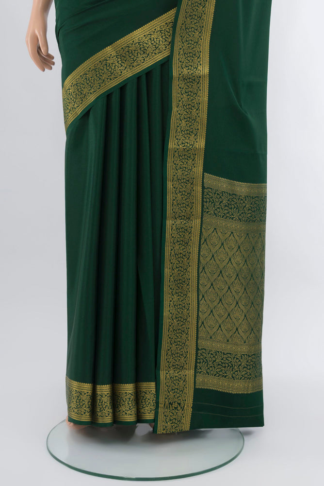 Pleats and pallu of Mint Green Mysore Crepe Saree with Plain Body and Silk Border. 