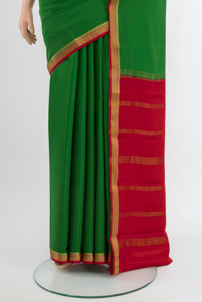 Pleats and pallu of Mint Green Mysore Crepe Saree with Plain Body and Silk Border. 
