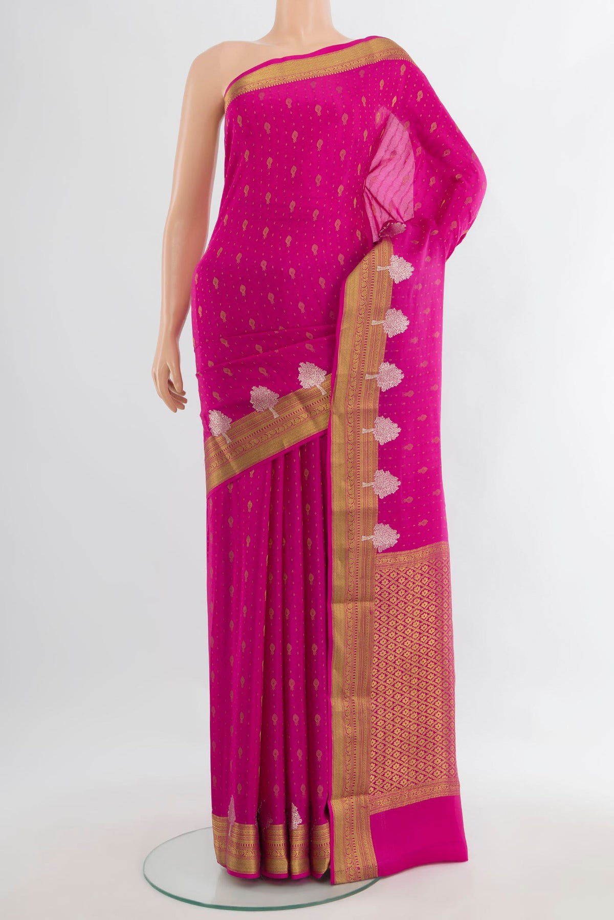Pink Mysore Crepe Saree with Zari Butta on the body and Zari Border.  displayed on a mannequin