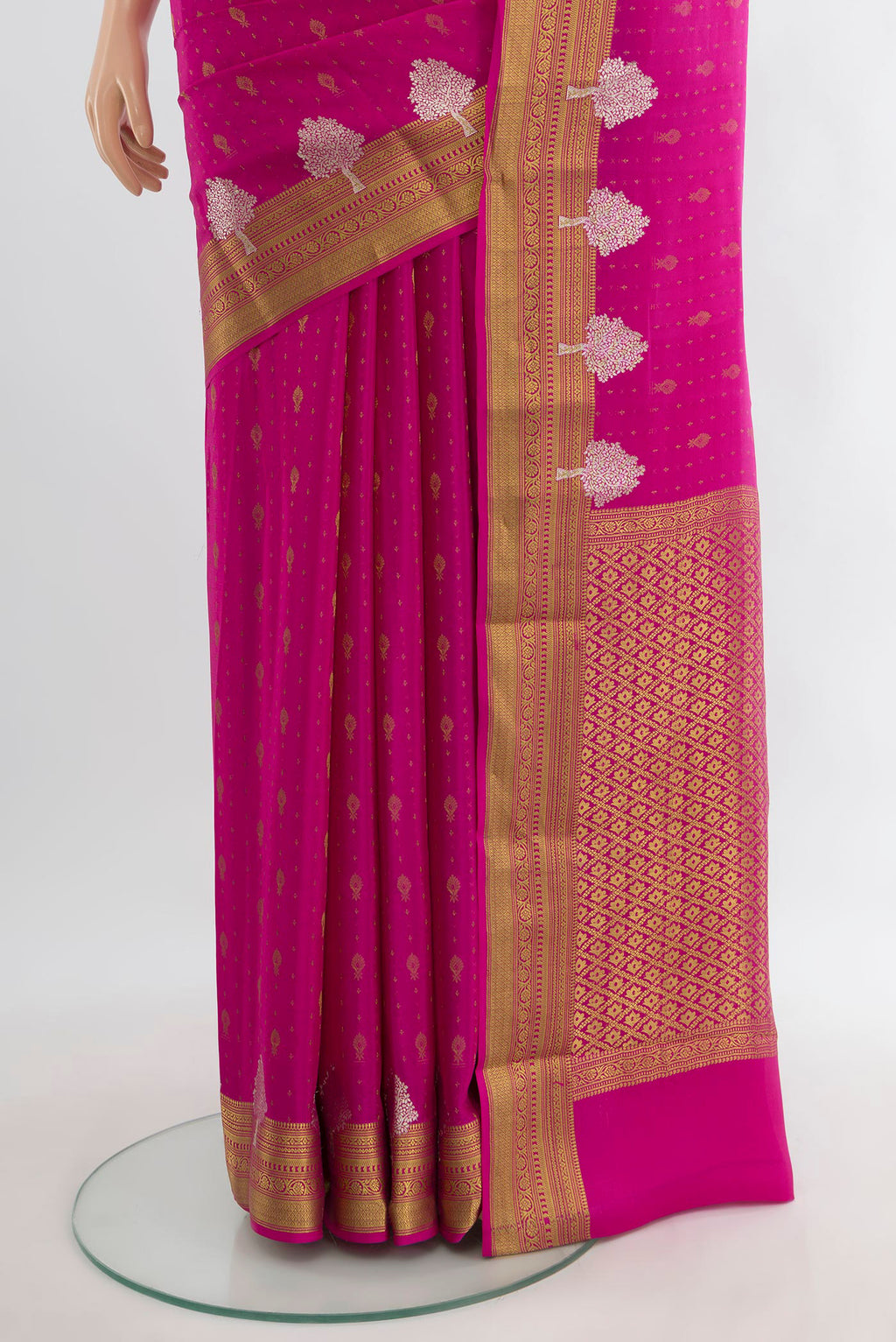 Pleats and pallu of Pink Mysore Crepe Saree with Zari Butta on the body and Zari Border. 