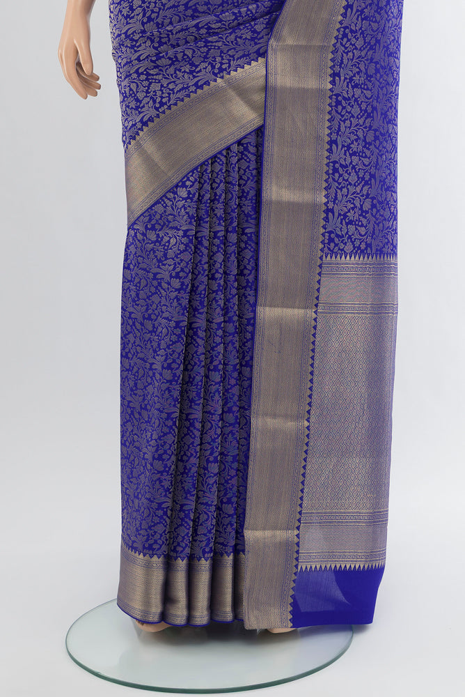 Pleats and pallu of Pure Silk Pure Zari Light Blue Georgette Saree with Zari Butta on the body and Silk Border. 