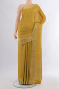 Mustard Mysore Crepe Saree with Zari Brocade on the body and Zari Border.  displayed on a mannequin
