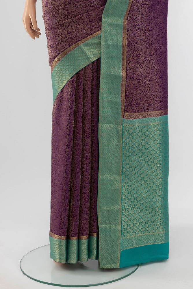 Pleats and pallu of Violet Mysore Georgette Saree with Zari Butta on the body and Silk Border. 