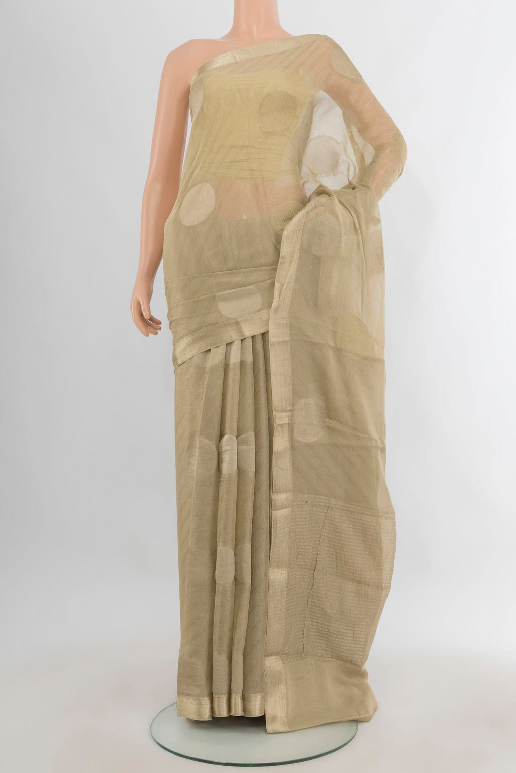 Golden Mysore Georgette Saree with Zari Butta on the body and Zari Border.  displayed on a mannequin