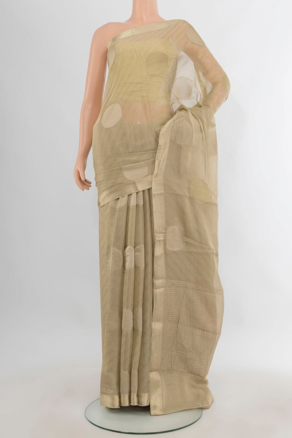 Golden Mysore Georgette Saree with Zari Butta on the body and Zari Border.  displayed on a mannequin