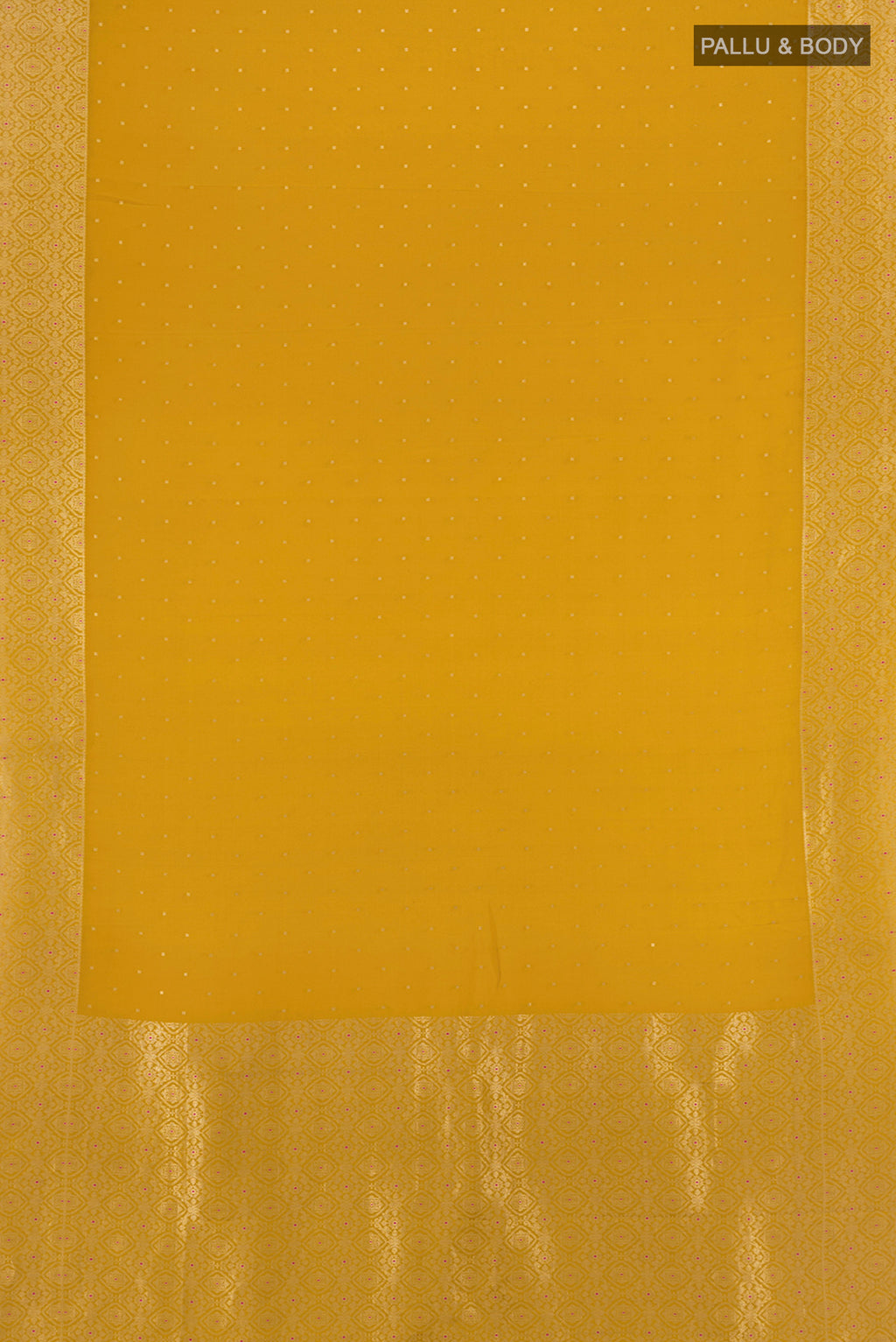 Flat view of Mustard Mysore Crepe Saree with Zari Butta on the body and Zari Border. 