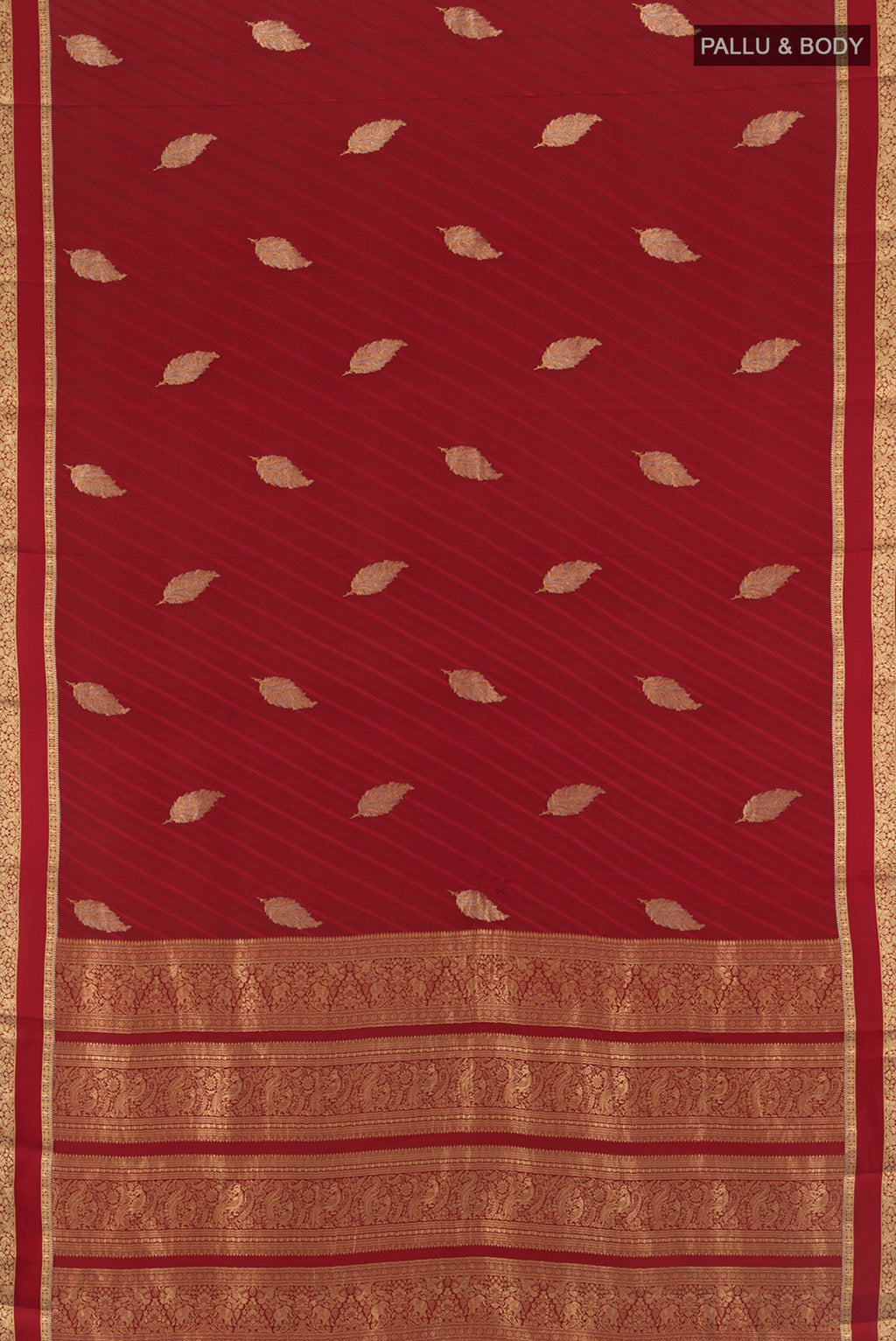 Flat view of Maroon Mysore Crepe Saree with Zari Butta on the body and Zari Border. 