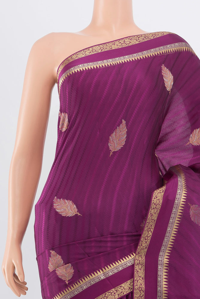 Border image of Purple Georgette Saree with Zari Butta on the body and Silk Border. 