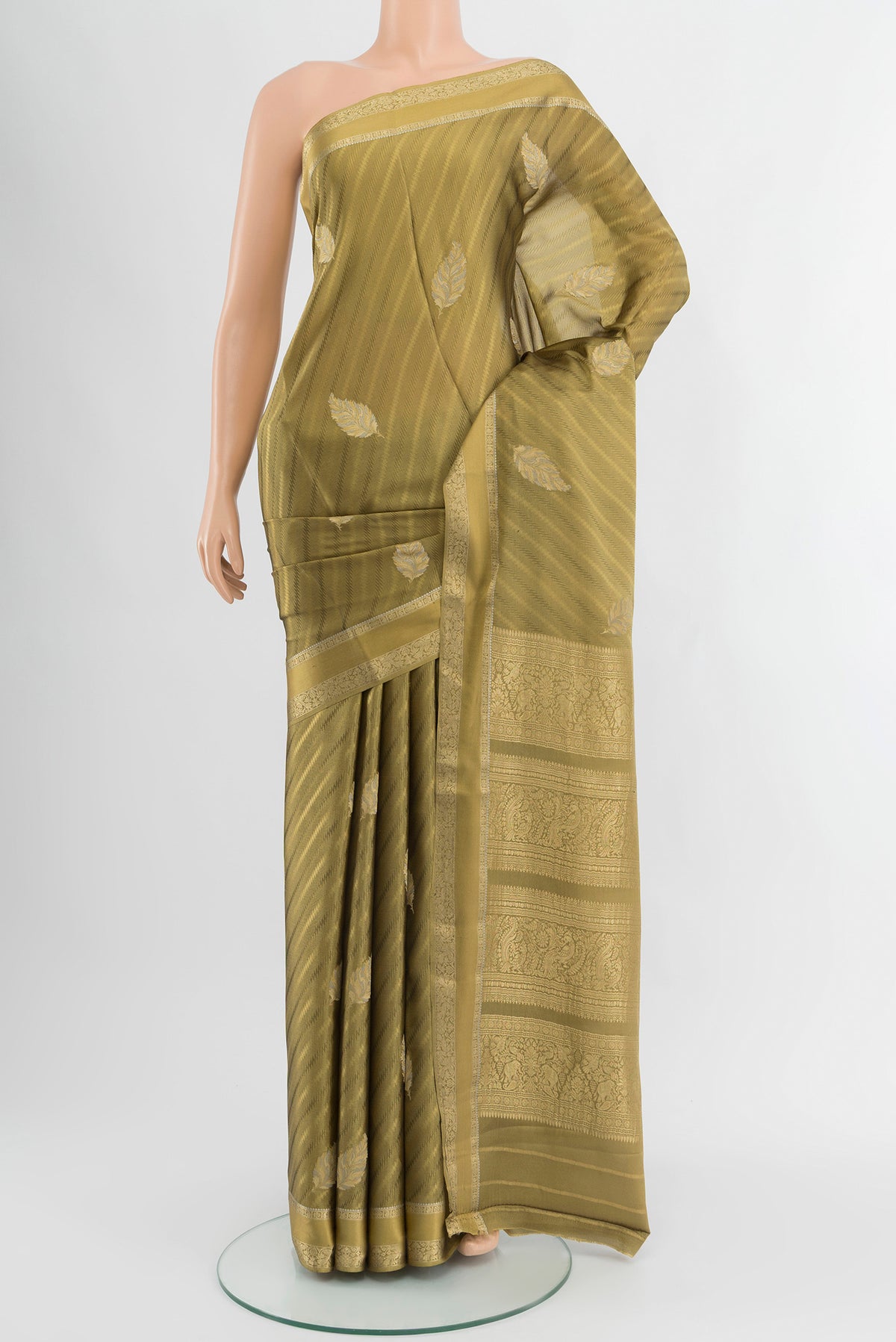 Mehandi Green Mysore Crepe Saree with Zari Butta on the body and Zari Border.  displayed on a mannequin