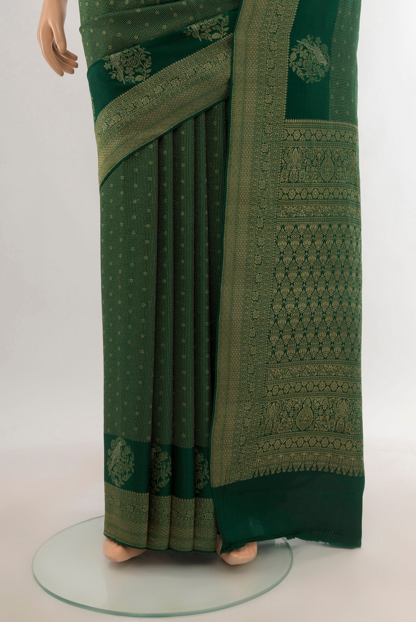 Pleats and pallu of Bottle Green Mysore Crepe Saree with Zari Brocade on the body and Zari Border. 