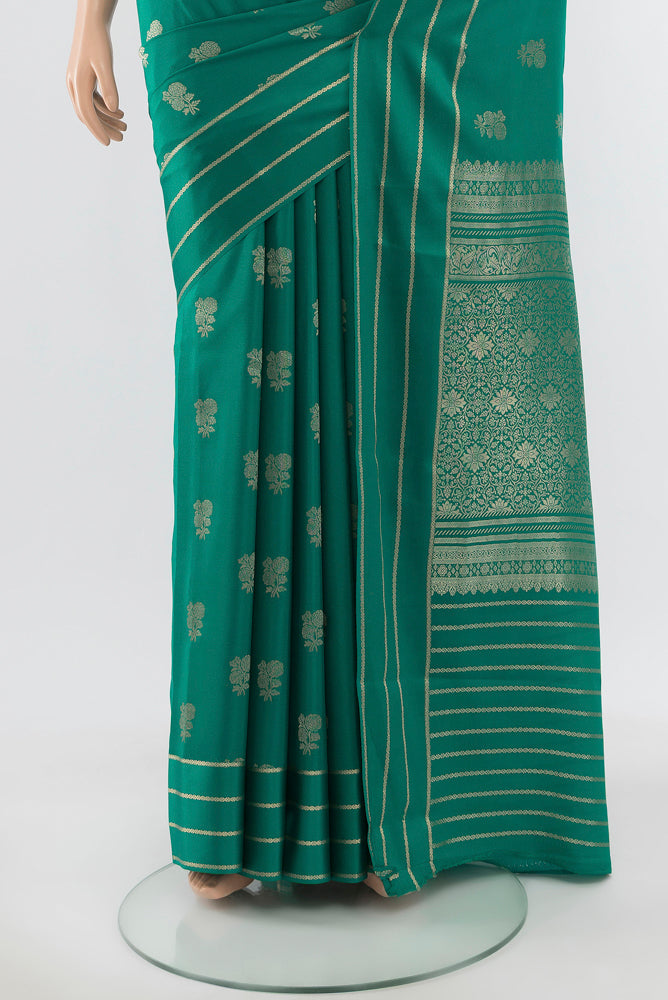 Pleats and pallu of Pure Silk Pure Zari Dark Mauve Mysore Crepe Saree with Zari Butta on the body and Silk Border. 