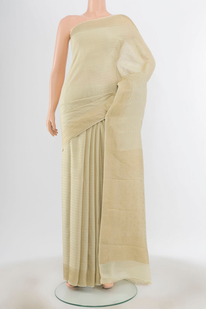 Off White Mysore Silk Saree with Zari Butta on the body and Silk Border.  displayed on a mannequin