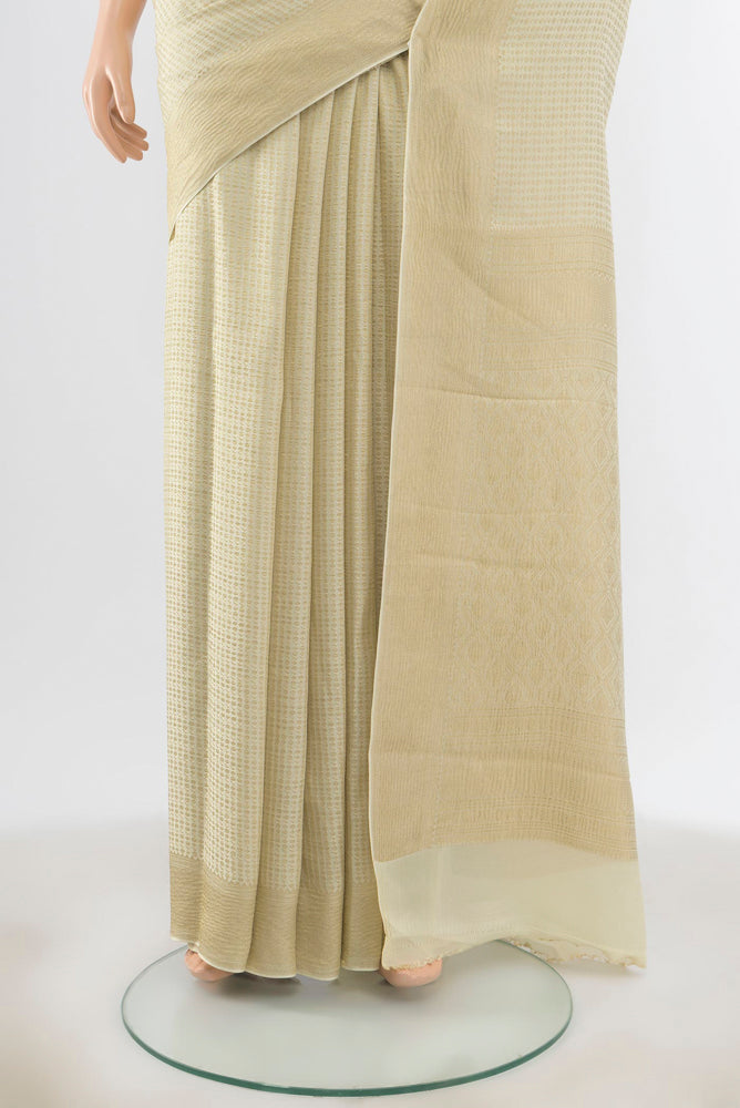 Pleats and pallu of Off White Mysore Silk Saree with Zari Butta on the body and Silk Border. 