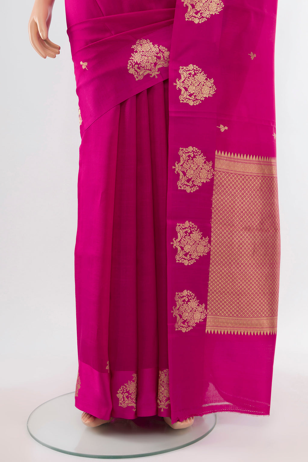 Pleats and pallu of Magenta Banarasi Katan Silk Saree with Zari Butta on the body and Silk Border. 