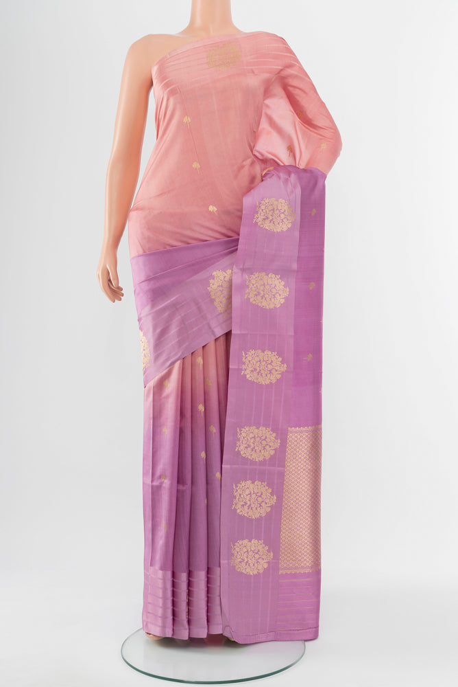 Multi Color Banarasi Katan Silk Saree with Zari Butta on the body and Silk Border.  displayed on a mannequin