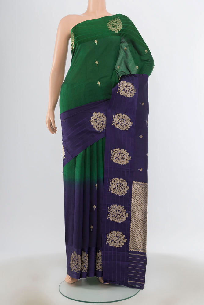 Multi Color Banarasi Katan Silk Saree with Zari Butta on the body and Silk Border.  displayed on a mannequin