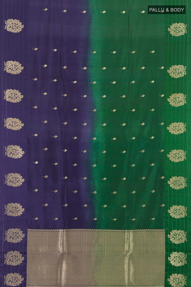 Flat view of Multi Color Banarasi Katan Silk Saree with Zari Butta on the body and Silk Border. 