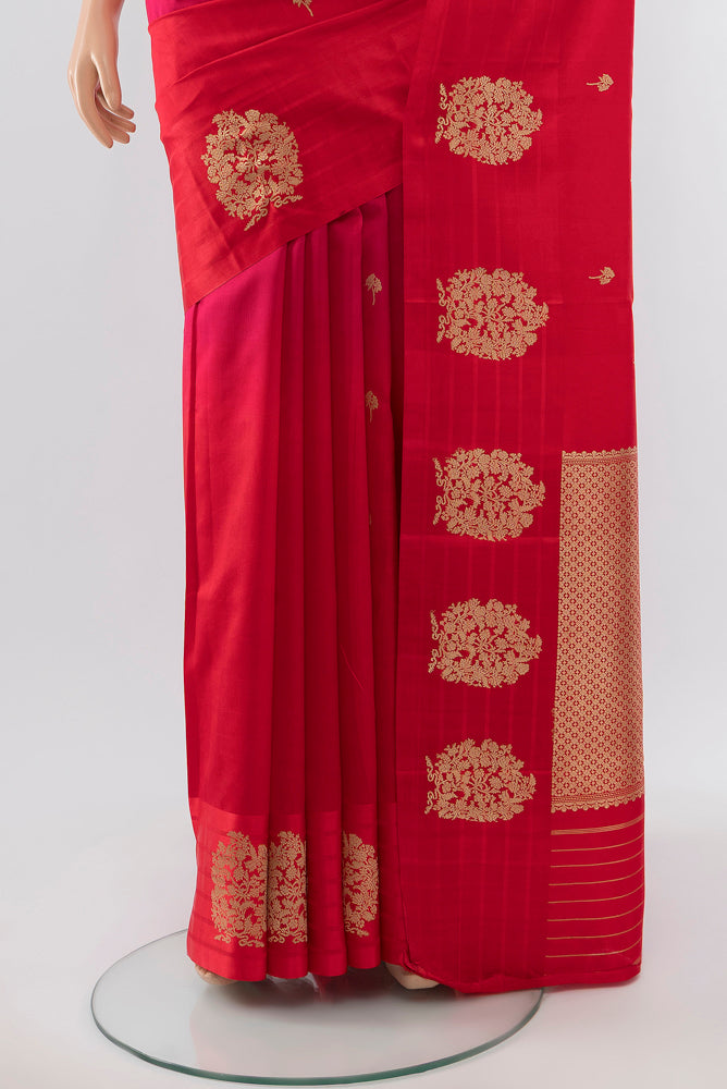 Pleats and pallu of Pure Silk Pure Zari Red Banarasi Katan Saree with Zari Butta on the body and Silk Border. 