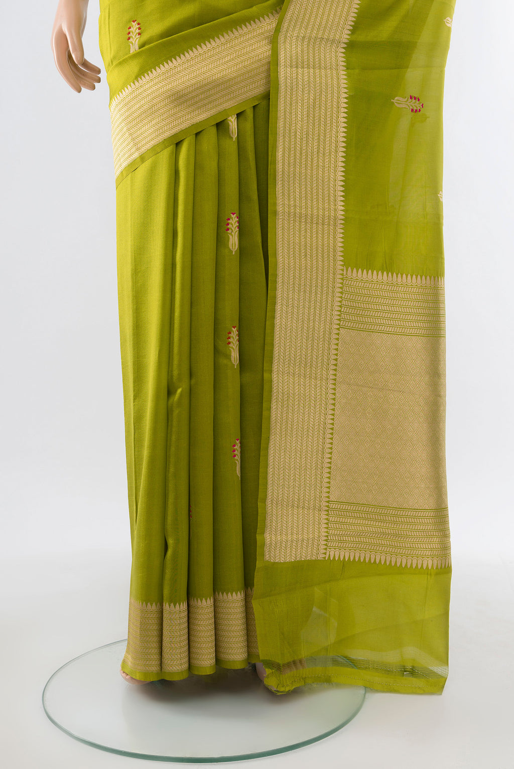 Pleats and pallu of Light Green Banarasi Katan Silk Saree with Zari Butta on the body and Silk Border. 