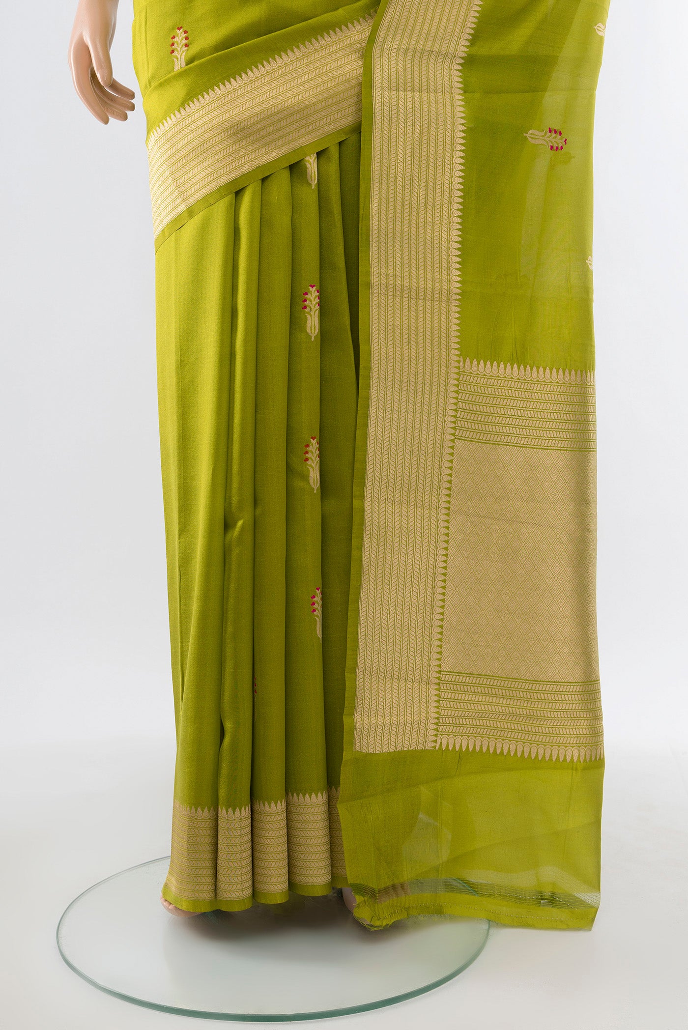 Pleats and pallu of Light Green Banarasi Katan Silk Saree with Zari Butta on the body and Silk Border. 