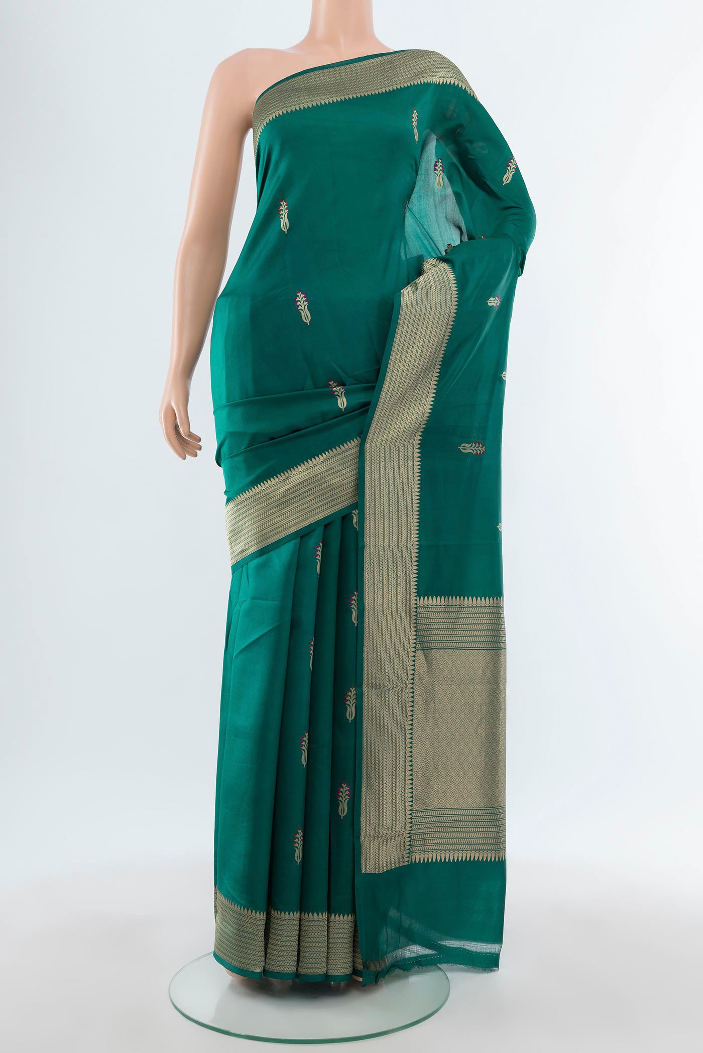 Teal Banarasi Katan Silk Saree with Zari Butta on the body and Zari Border.  displayed on a mannequin