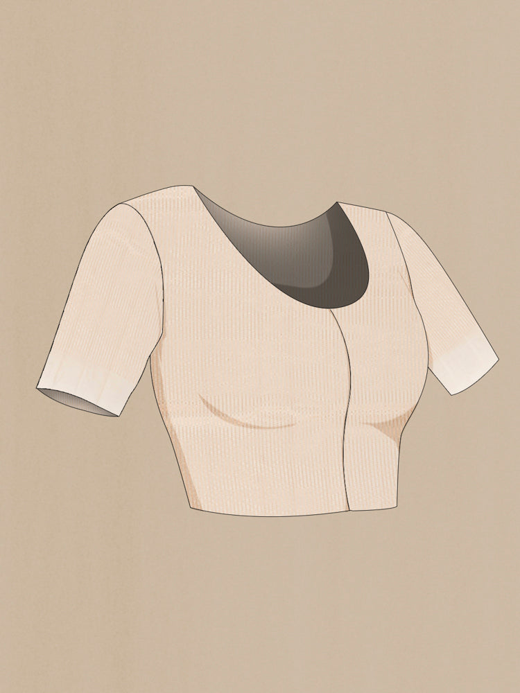 Close up image of the blouse of Cream Banarasi Katan Silk Saree with Zari Butta on the body and Silk Border. 
