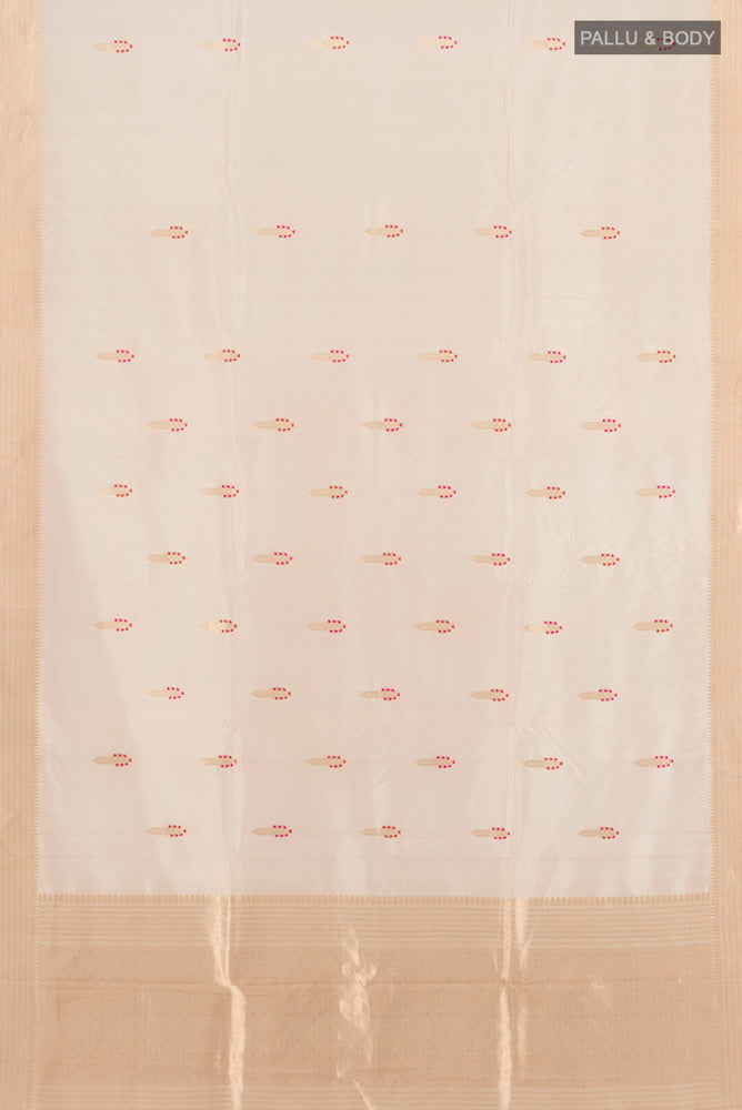 Flat view of Cream Banarasi Katan Silk Saree with Zari Butta on the body and Silk Border. 