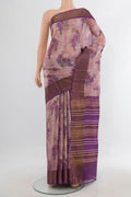 Rose Gold Tussar Saree with Floral Print on the body and Zari Border.  displayed on a mannequin