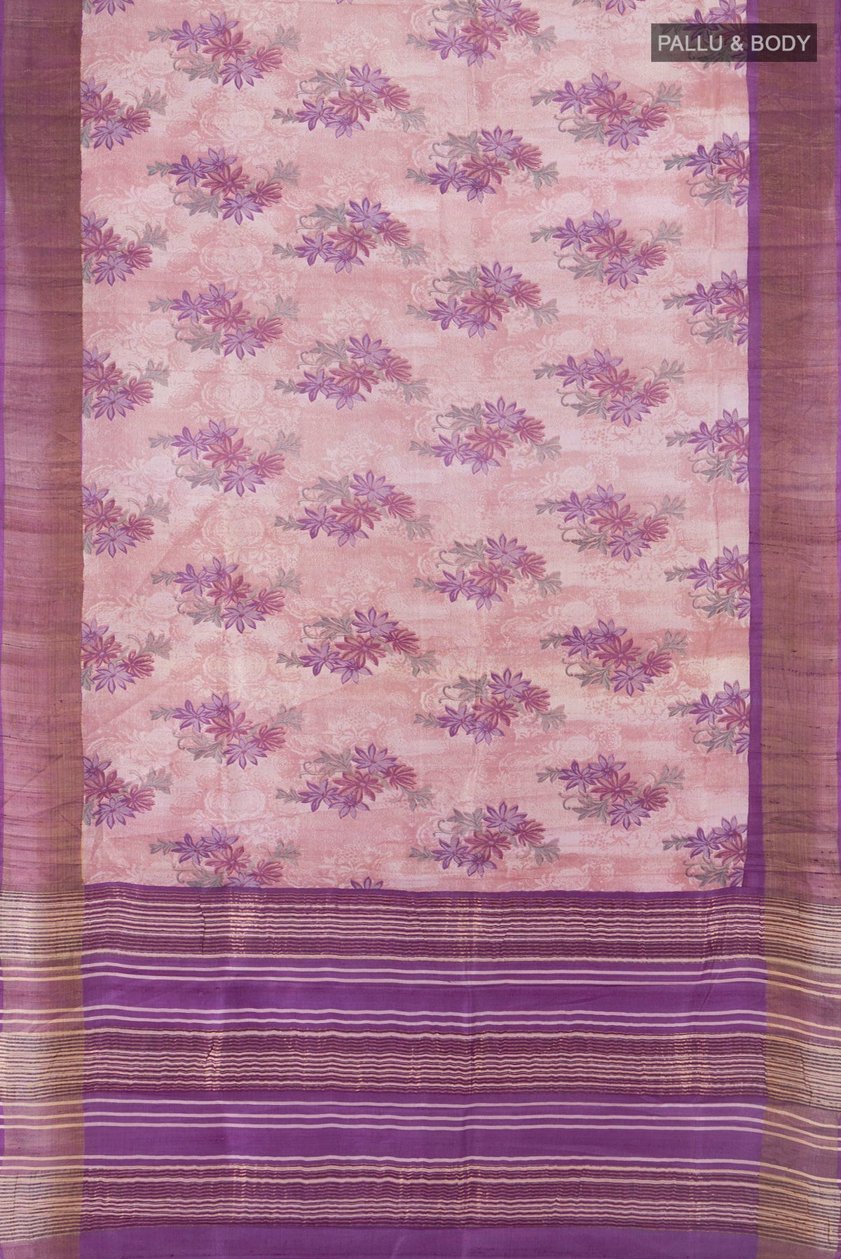 Flat view of Rose Gold Tussar Saree with Floral Print on the body and Zari Border. 