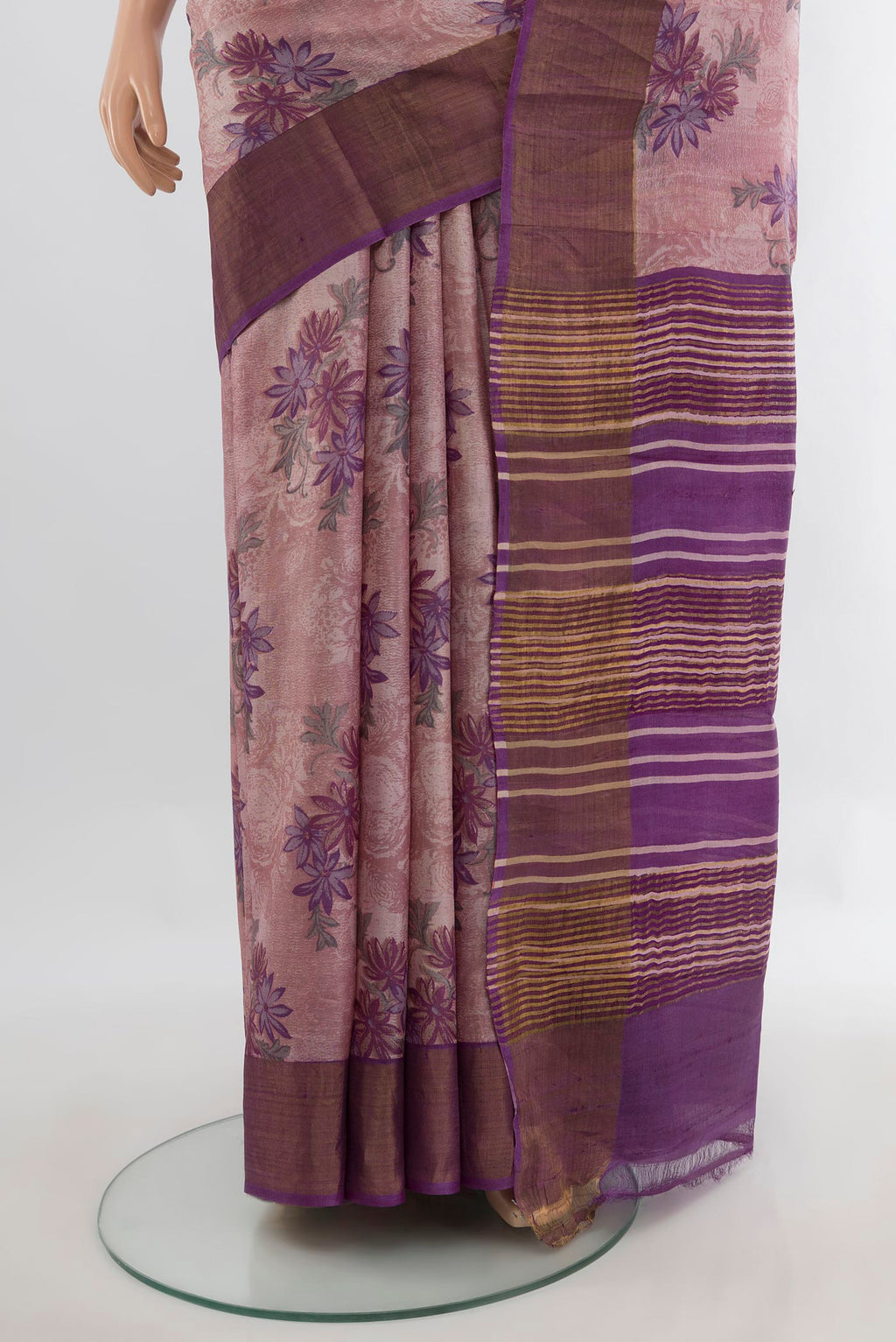 Pleats and pallu of Rose Gold Tussar Saree with Floral Print on the body and Zari Border. 