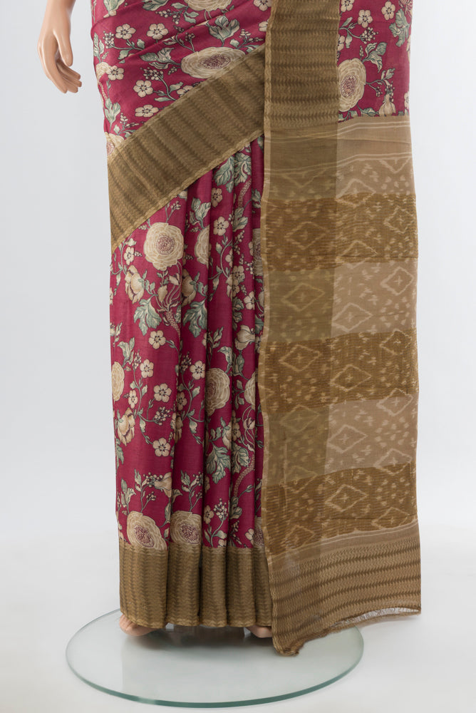 Pleats and pallu of Bronze Tussar Silk Saree with Floral Print on the body and Silk Border. 