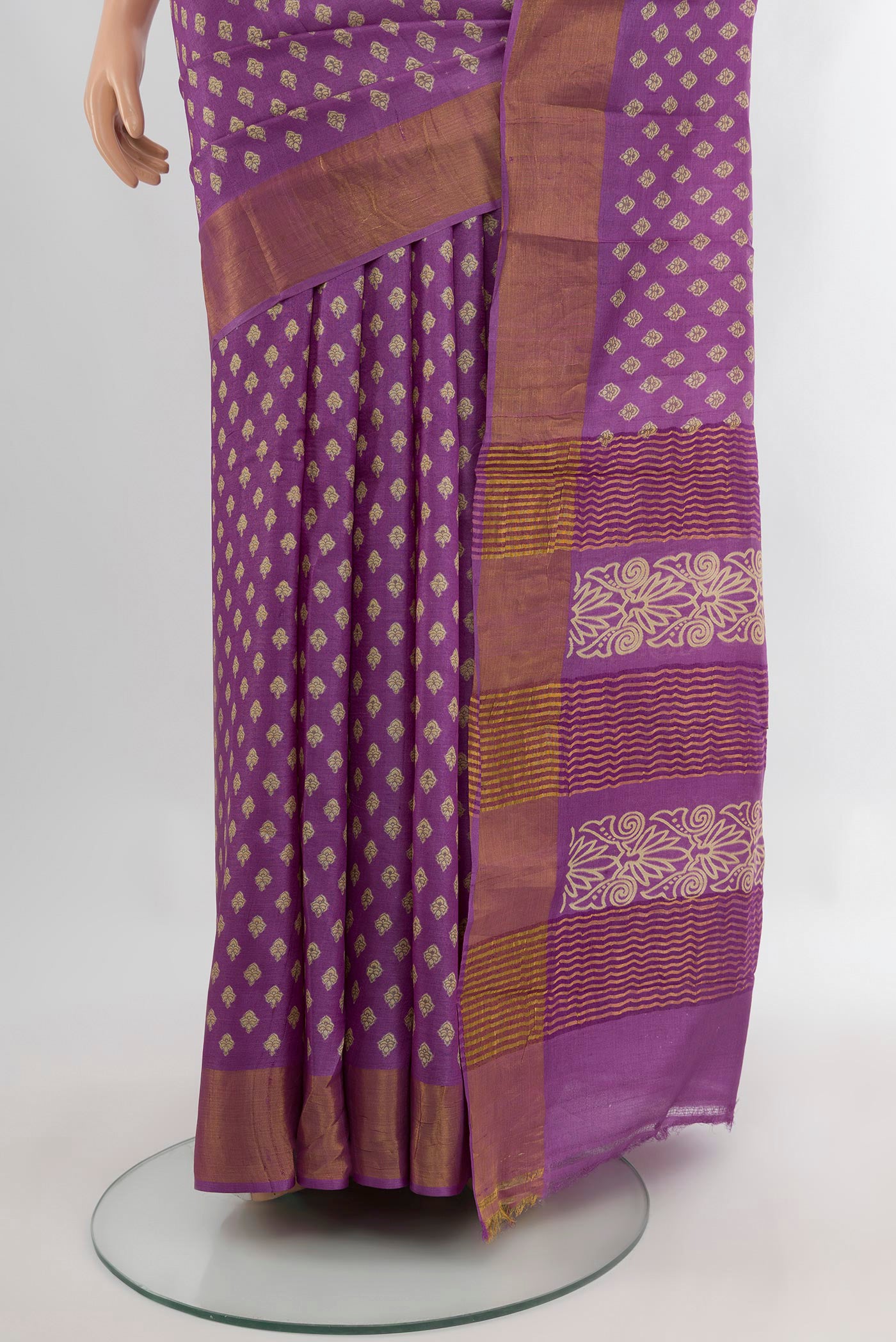 Pleats and pallu of Violet Tussar Silk Saree with Floral Print on the body and Zari Border. 