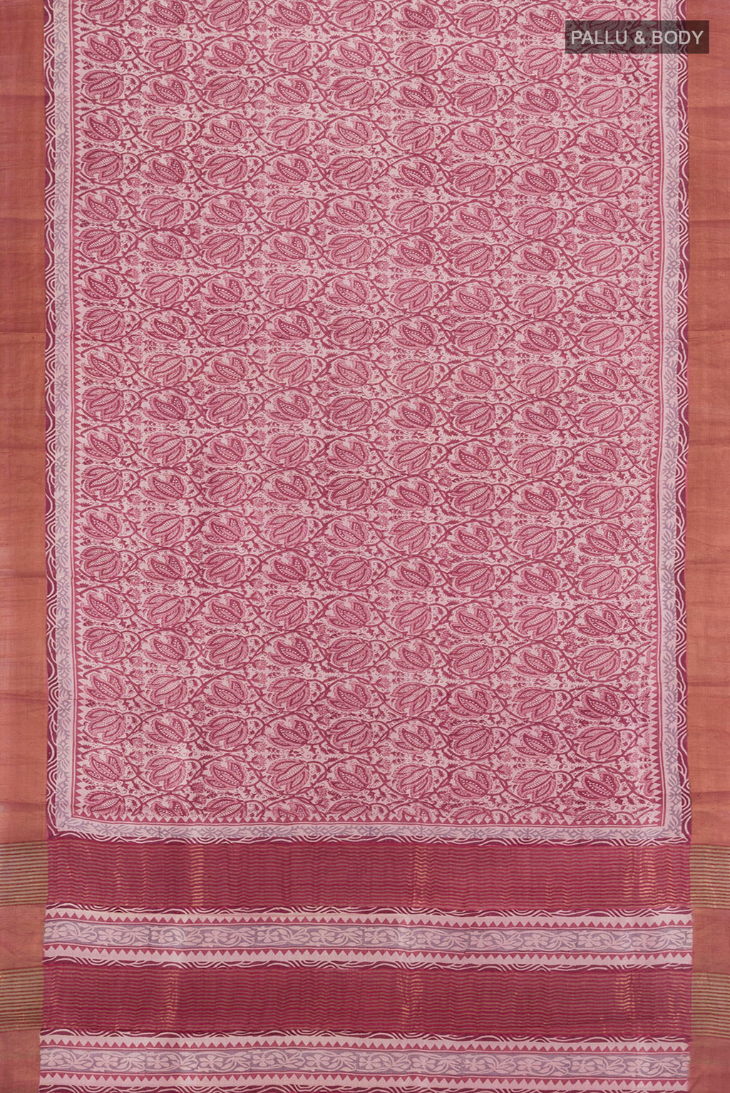 Flat view of Dark Mauve Tussar Silk Saree with Printed design on the body and Zari Border. 