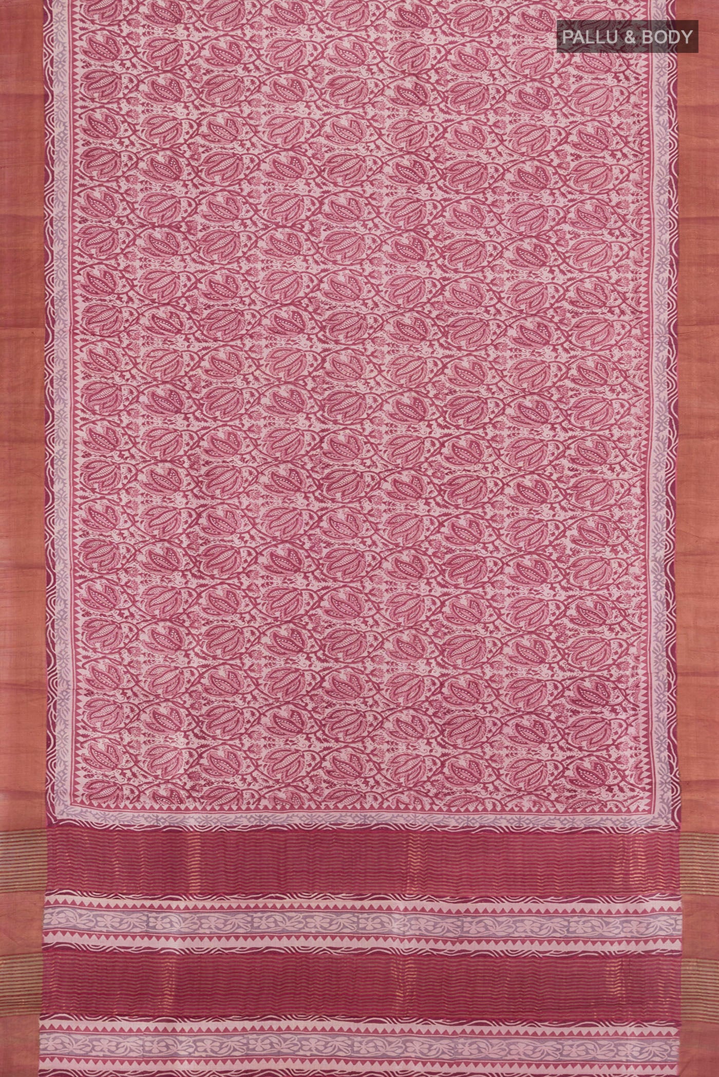 Flat view of Dark Mauve Tussar Silk Saree with Printed design on the body and Zari Border. 