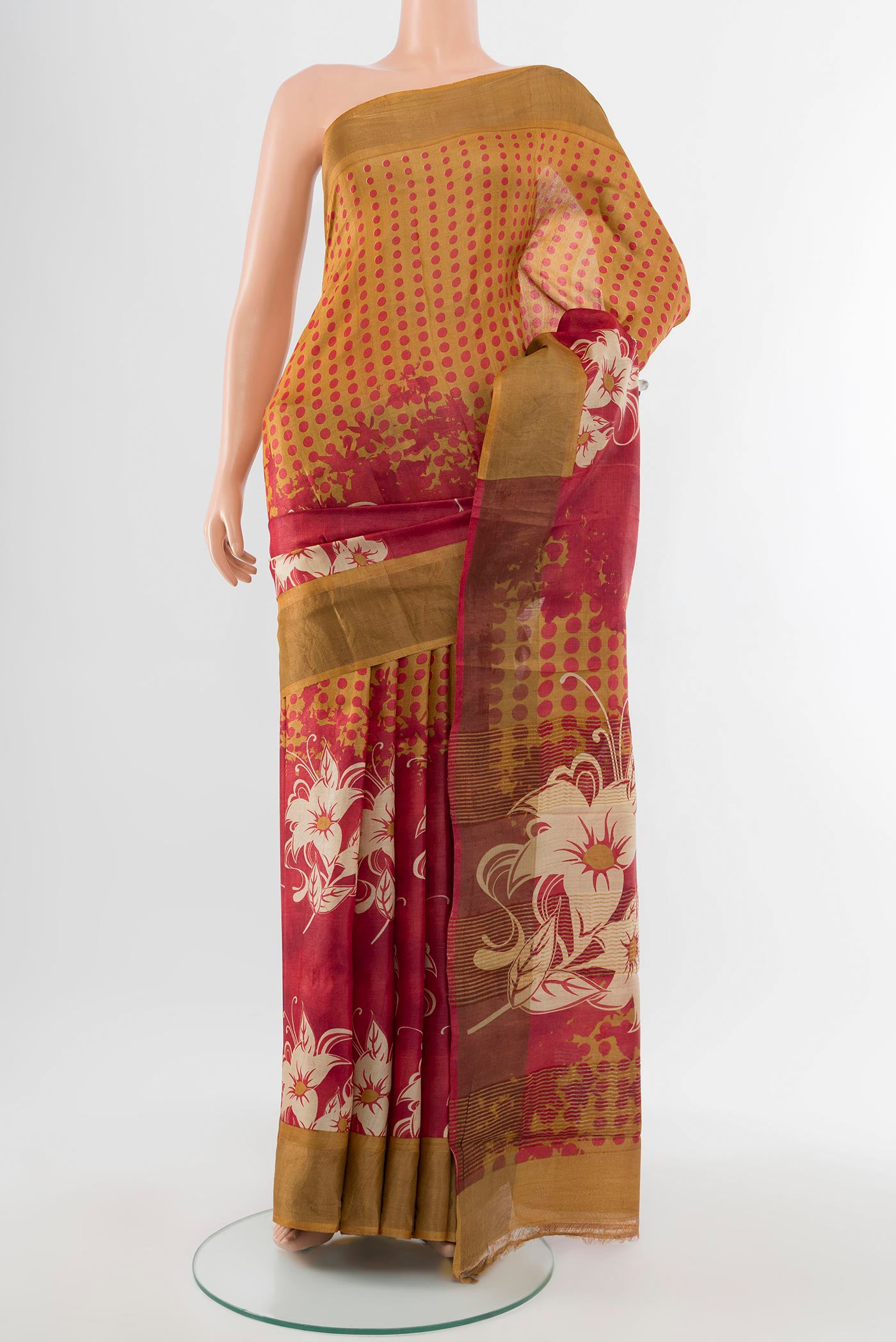 Multi Color Tussar Silk Saree with Floral Print on the body and Silk Border.  displayed on a mannequin